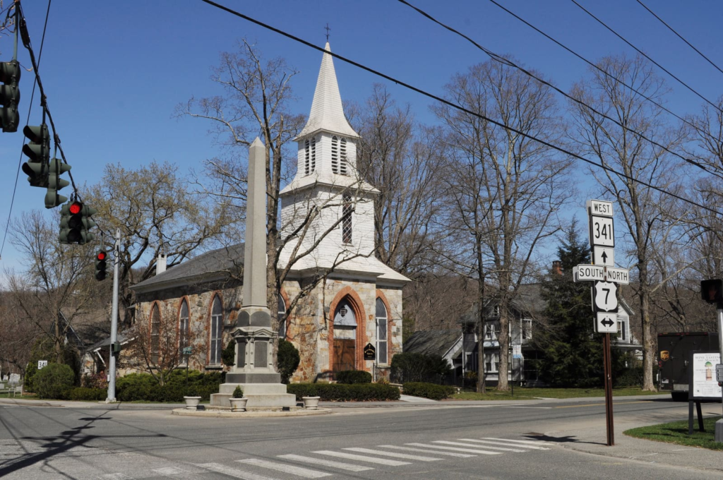 Civil War monument and St Andrews Church in Kent, Connecticut